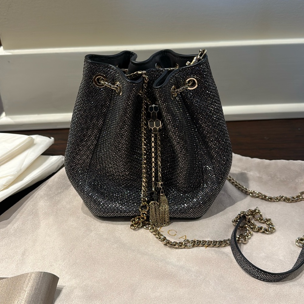 New Bvlgari serpentine forever bucket bag in gray metallic leather with gold.
